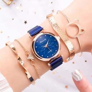 Elegant blue Milanese mesh watch with four gold cat-ear and geometric charm bracelets