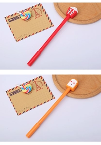 Detail of creative cartoon pens featuring red popcorn and orange toast character tops