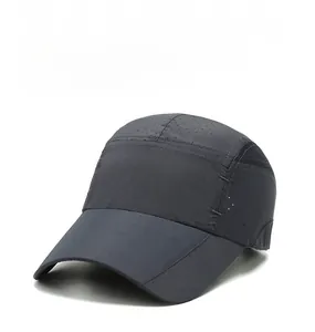 Detail view of laser-cut ventilation holes on breathable dark grey baseball cap