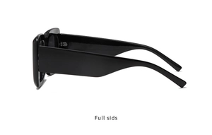 Side view detail of shiny black sunglasses with wide retro temples on white background
