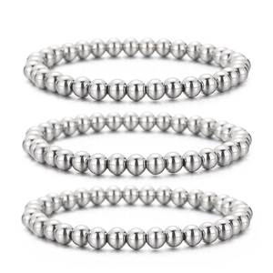 Three-piece set of polished metal bead elastic bracelets in minimalist silver finish
