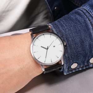 Minimalist men's quartz watch with white dial, silver case and black leather strap