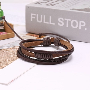 Close-up of adjustable multi-layer woven leather bracelet in brown and dark brown tones