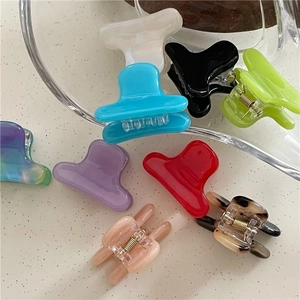 Mini colorful acetate claw clips in various candy colors with metal springs for women