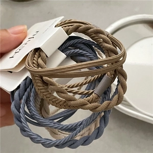 Elastic hair tie set with braided and multi-strand designs in earth tone colors
