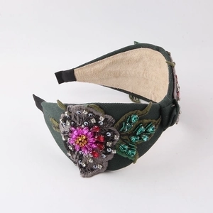 Deep green headband with exquisite floral embroidery and sparkling colorful sequins