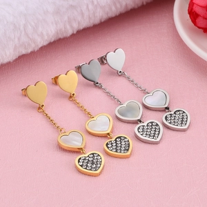 Chic gold and silver heart-shaped drop earrings with shells and sparkling rhinestones