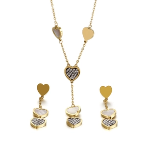 Golden stainless steel heart jewelry set with white mother of pearl and crystal accents