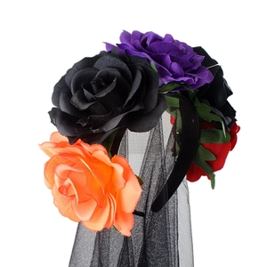 Detail view of colorful artificial roses and black mesh veil on Halloween headband