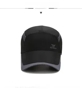 Front view of breathable mesh and quick-dry fabric panels on a gray and black baseball cap