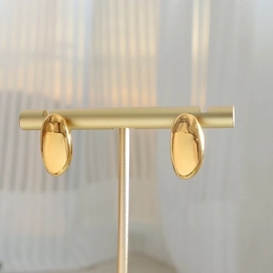 Minimalist 18K gold plated rice grain stud earrings in polished stainless steel