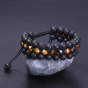 Triple-row braided lava stone and tiger eye bead bracelet with adjustable cord