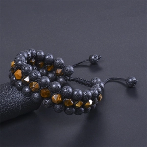 Three-layer lava rock and tiger eye stone braided bracelet with adjustable cord
