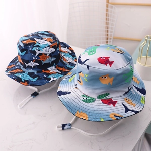Detail of kids sun hats with shark and sea creature prints and adjustable chin straps