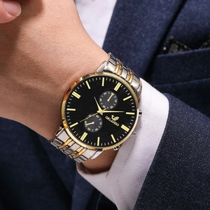 Men's two-tone gold and silver stainless steel quartz watch with a black business dial