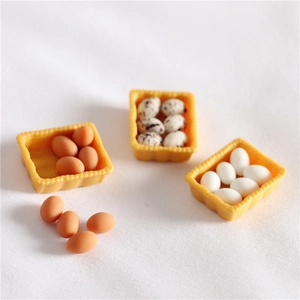 Macro view of detailed miniature resin egg baskets for dollhouse OB11 model scenery
