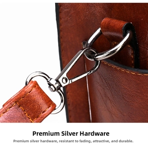 Detail of silver-tone hardware and vintage brown leather shoulder strap connector
