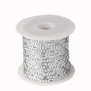 Close-up of 2.5mm silver Figaro metal chain roll for DIY jewelry making accessories