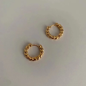 Classic gold twisted rope metal hoop earrings with a polished vintage finish for women