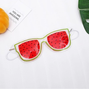 Watermelon cooling gel sleep mask for eye fatigue relief on white textured background