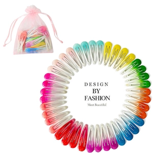 Detail view of colorful gradient macaron hair clips set with pink organza storage bag