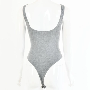 Detail of grey ribbed bodysuit featuring a deep U-back design and high-cut thong style