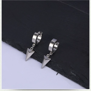 Detailed view of silver stainless steel earrings with geometric triangle cone pendants