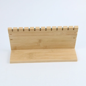 Minimalist bamboo jewelry display stand for necklaces and earrings on white background