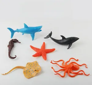 Detailed set of six realistic marine animal toy figures including shark and octopus