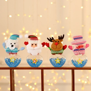Set of 4 Christmas candy jars with plush Santa, reindeer, snowman, and polar bear toppers