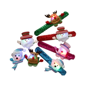 LED Christmas slap bracelets featuring Santa Claus, Reindeer and Snowman in vibrant colors
