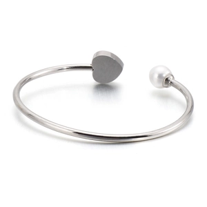 Silver open heart bangle with a white pearl accent for women, elegant minimalist jewelry