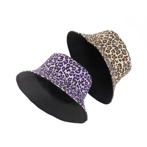 Women's reversible leopard print bucket hat in purple and brown canvas for sun protection
