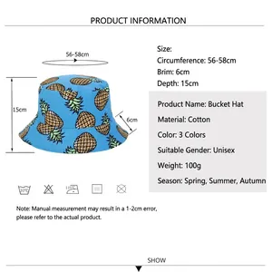 Blue cotton bucket hat with golden pineapple print and size dimensions chart
