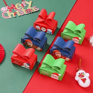 Christmas gift boxes with bows featuring Santa and snowman patterns in a multi-color set