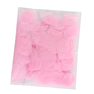 Detailed view of pink round paper confetti in a clear polybag for gender reveal