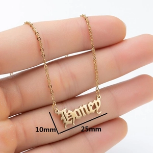 Gothic Honey pendant necklace in gold stainless steel with 25mm x 10mm dimensions