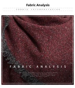 Close-up of thick red and black mixed tweed fabric texture with soft fiber tassels