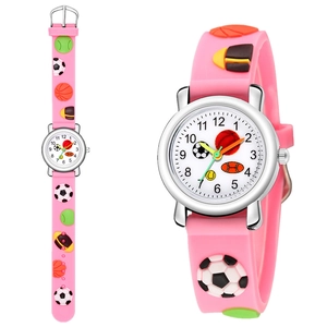 Detail of pink children's watch featuring 3D embossed sports balls on silicone strap