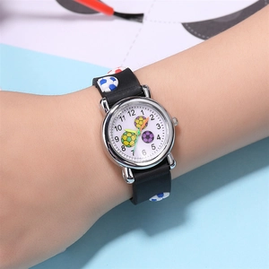 Detailed macro view of children's soccer watch with 3D relief strap and colorful dial