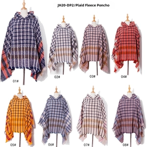 Detail view of hooded checkered ponchos in eight colors with stylish fringe edges