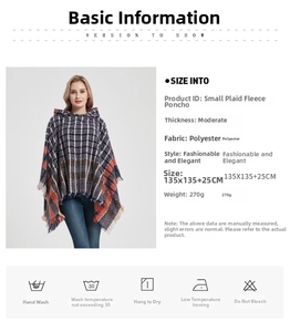 Detail view of plaid hooded poncho showing blue and brown fabric with size specifications