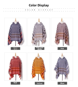 Detail view of plaid hooded ponchos with fringes in six different color options