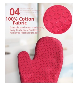 Detail of red cotton oven glove with anti-slip silicone strips and heat resistance
