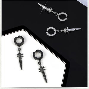 Detail of punk style sword pendant clip earrings in black and silver metallic finish