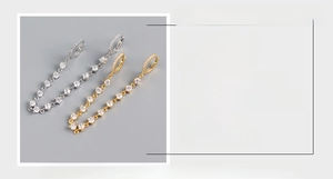 Detailed view of S925 sterling silver tassel earrings with sparkling zircon crystals