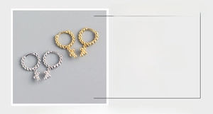 Detailed view of S925 sterling silver ball hoop earrings with cross pendants and size specs