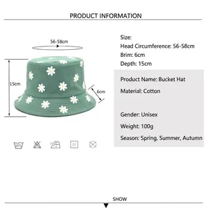 Chapeau bob en coton vert menthe avec imprimé marguerite et détails des tailles