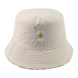 Beige reversible bucket hat with daisy embroidery made of premium twill cotton canvas
