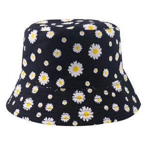 Double-sided sun hat with white and yellow daisy print on black canvas fabric